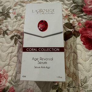 Coral Collection Age Reversal Serum - White and Red